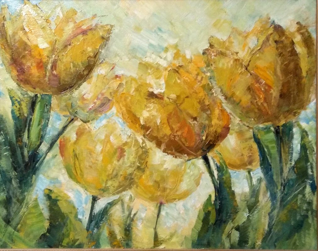 Живописные жёлтые тюльпаны своими головками тянутся к весеннему солнцу.