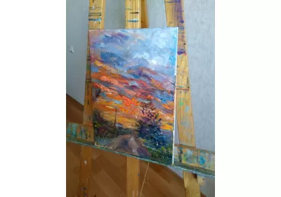Картина "Дачный закат" на мольберте.
