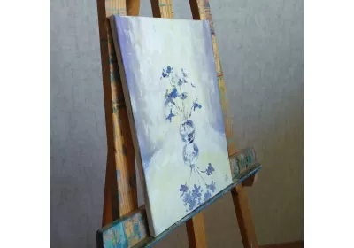 Полотно с картиной "Против света" на мольберте.